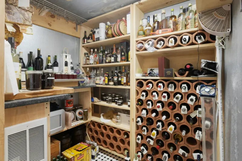 Precision temperature-controlled wine storage refrigeration unit and compressor maintenance