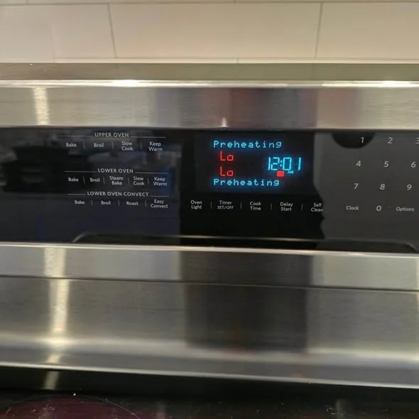 GE range digital display showing Preheating Lo Lo error during field diagnostics in South Boston